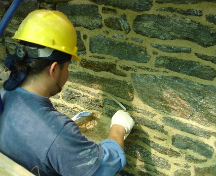 Worker installs Spec Joint 46L lime mortar